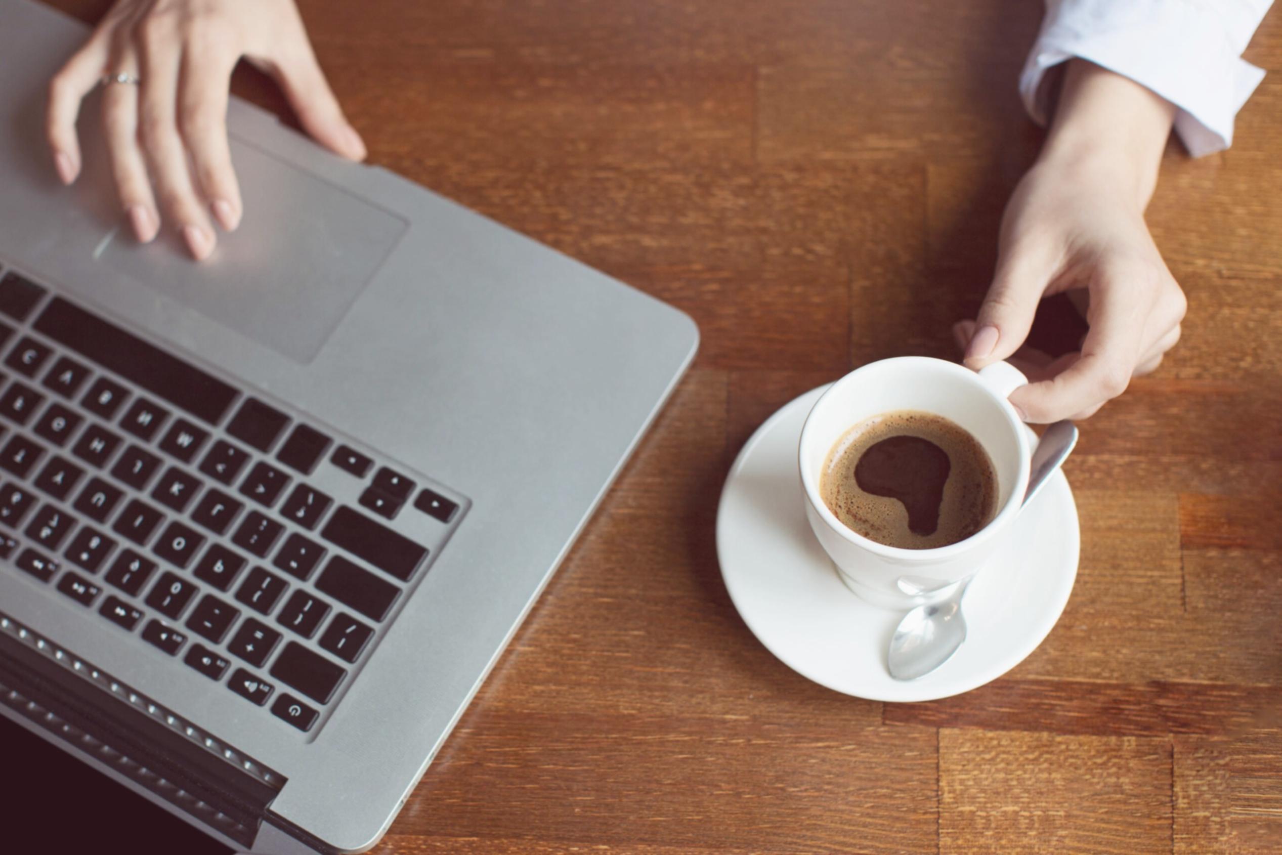 Writing workshop session with participants reviewing manuscript pages and discussing narrative structure techniques