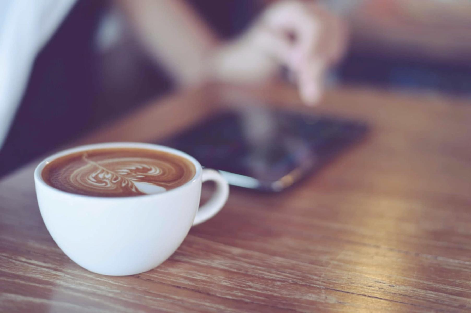 Instructor providing detailed feedback on student manuscript during one-on-one session